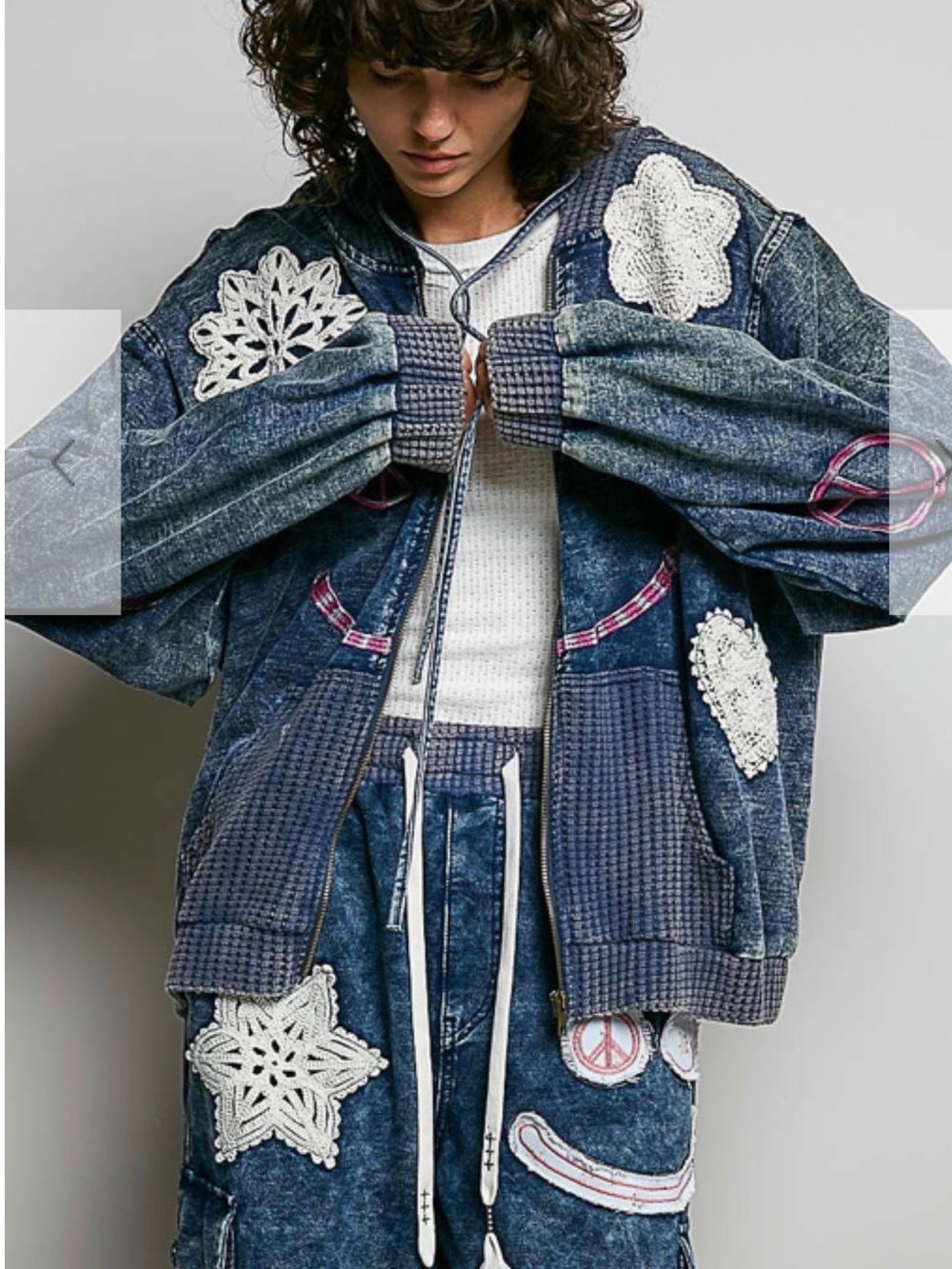 Pol jacket with crochet and a smiley face.